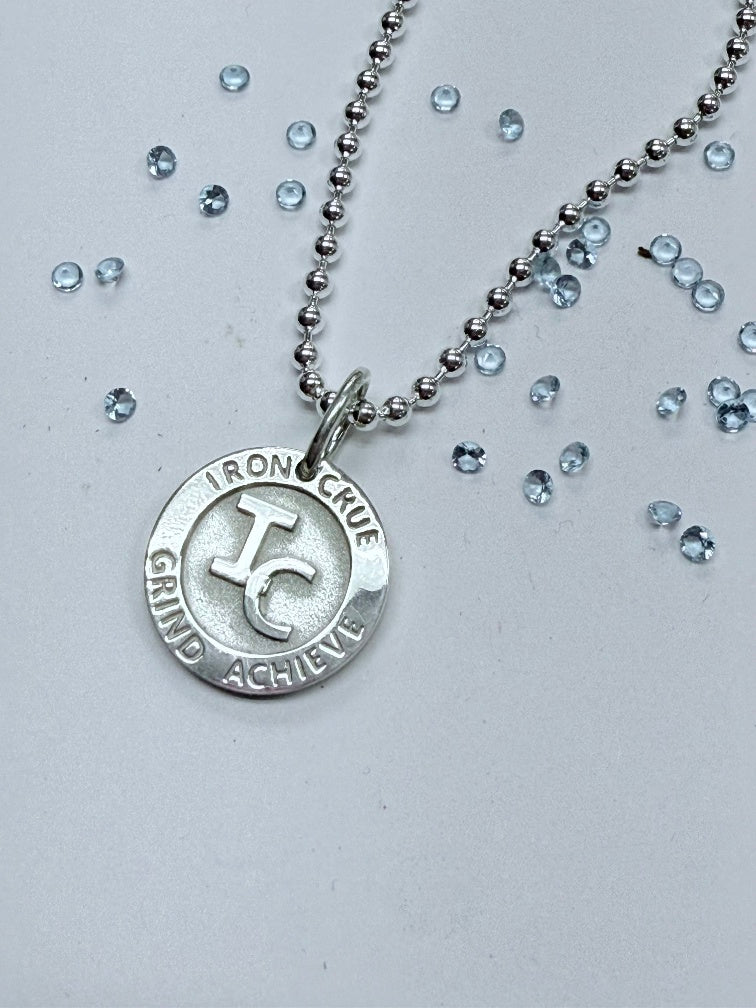 Signature Round Iron Crue Sterling Silver Pendant